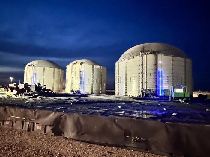 Tank farm at dusk with SHIELD blue LED level indicators